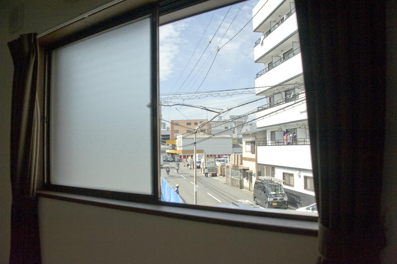 Umbrella House Vandrehjem Osaka Eksteriør billede